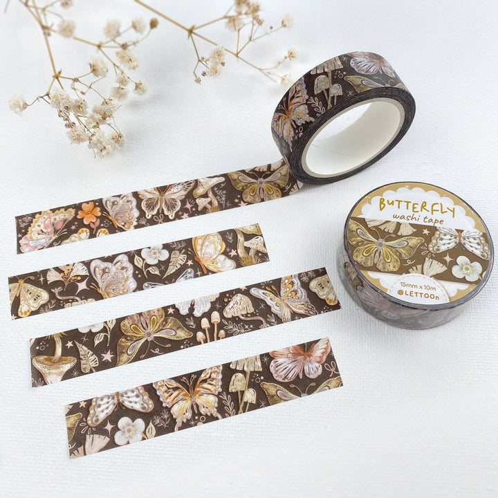 Premium Handmade Washi Tape Butterfly 15mm x 10m - 4 pieces and 2 washi tapes on the table with a white flower branch