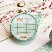 Premium Handmade Washi Tape Choco Mint 15mm x 10m - 2 washi tapes on the table with a pink flower branch and chapter sheet