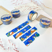 Premium Handmade Washi Tape Cozy Winter 20mm x 10m - 4 pieces and 4 washi tapes on the table with 2 dark maroon flower branches, a sticker sheet, a chapter heading, a notebook