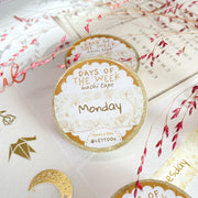 Premium Handmade Washi Tape Days of The Week 15mm x 10m - 2 washi tapes on the table with 2 pink flower branches, a heading chapter, a sticker sheet