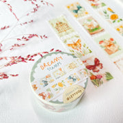 Premium Handmade Washi Tape Dreamy Stamp 25mm x 5m - 3 pieces and a washi tape on the table with a pink flower branch, a notebook