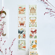 Premium Handmade Washi Tape Dreamy Stamp 25mm x 5m - 2 pieces on the table with 2 pink flower branches, a sticker sheet