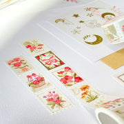 Premium Handmade Washi Tape Floral Stamps 25mm x 5m - 2 pieces and a washi tape on the table with a sticker sheet