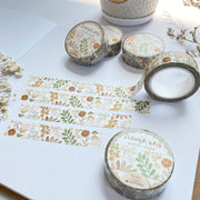 Premium Handmade Washi Tape Flower Grid 15mm x 10m - 4 pieces and 5 washi tapes on the table with 2 white flower branches, a cup of tea