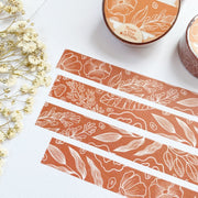 Premium Handmade Washi Tape Flower Pattern 15mm x 10m - 4 pieces and 2 washi tapes on the table with a white flower branch