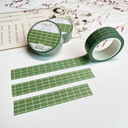 Premium Handmade Washi Tape Forest Grid 15mm x 10m - 3 pieces and 3 washi tapes on the table with a pink flower branch, a heading chapter