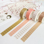 Premium Handmade Washi Tape Gridtastic 15mm x 10m - 4 pieces and 4 washi tapes on the table with a dark maroon flower branch, a chapter heading, a sticker sheet
