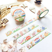 Premium Handmade Washi Tape Hallo Holland 15mm x 10m - 4 pieces and 3 washi tapes on the table with a white hydrangea flower branch, 2 wood stars, a wood heart, a wood gift, a round sedge weave, an acorn