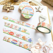 Premium Handmade Washi Tape Hallo Holland 15mm x 10m - 4 pieces and 3 washi tapes on the table with a white hydrangea flower branch, 2 wood stars, a wood heart, a wood gift, a round sedge weave, an acorn