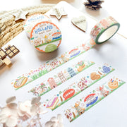 Premium Handmade Washi Tape Hallo Holland 15mm x 10m - 4 pieces and 3 washi tapes on the table with a white hydrangea flower branch, 2 wood stars, a wood heart, a wood gift, a round sedge weave, an acorn