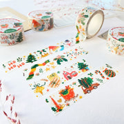 Premium Handmade Washi Tape Happy Holidays 20mm x 10m - 4 pieces and 4 washi tapes on the table with 2 dark maroon flower branches, a sticker sheet, a chapter heading, a notebook