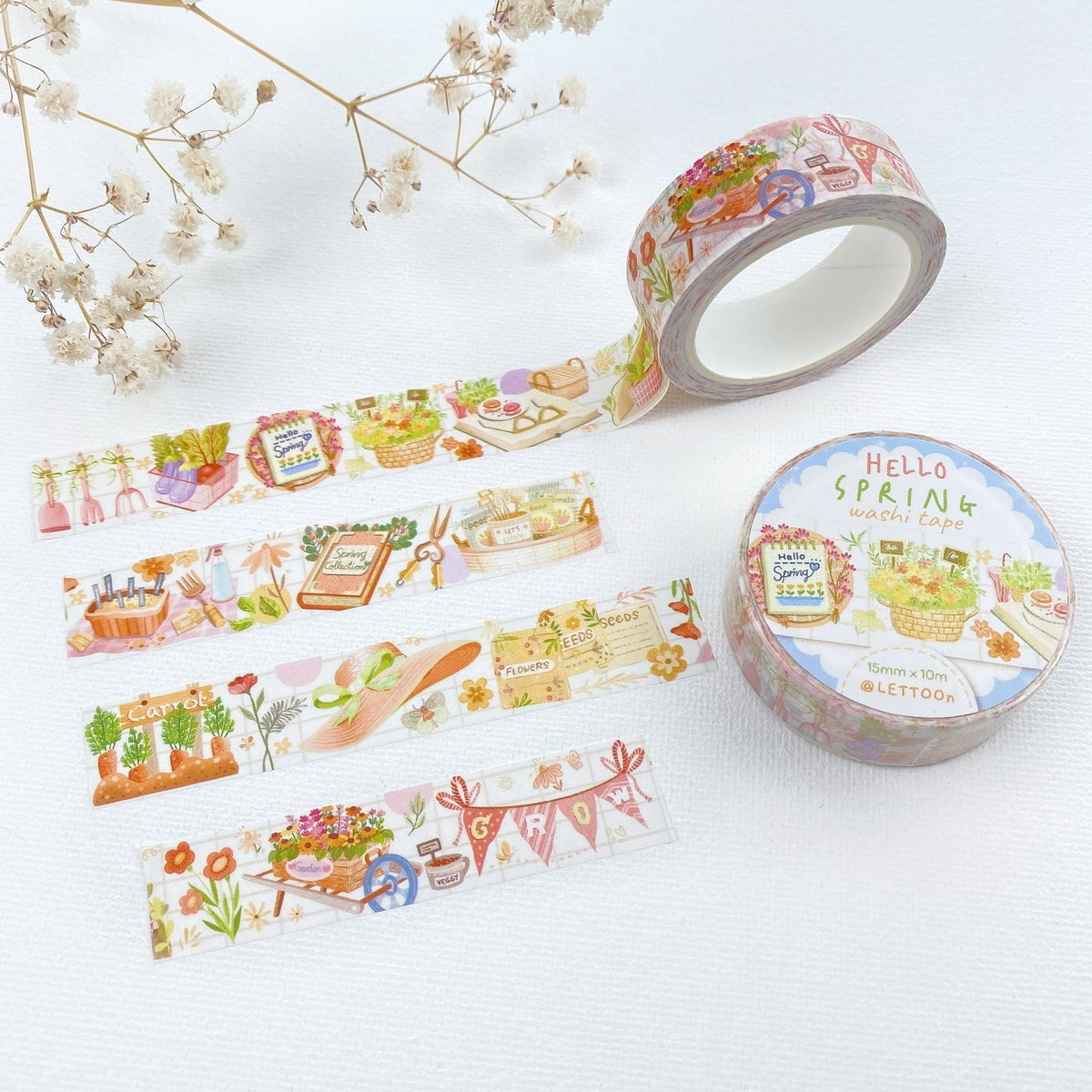 Premium Handmade Washi Tape Hello Spring 15mm x 10m - 3 pieces and 2 washi tapes on the table with a white flower branch