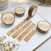 Premium Handmade Washi Tape Light Flower Pattern 15mm x 10m - 4 pieces and 5 washi tapes on the table with 2 white flower branches, a notebook, a cup of tea