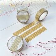 Premium Handmade Washi Tape Olive Green Grid 15mm x 10m - 3 pieces and 4 washi tapes on the table with 2 dark maroon flower branches, a chapter heading, a sticker sheet