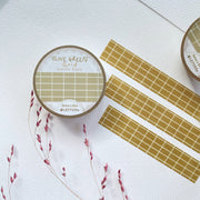 Premium Handmade Washi Tape Olive Green Grid 15mm x 10m - 3 pieces and 2 washi tapes on the table with a dark maroon flower branch