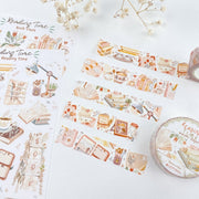 Premium Handmade Washi Tape Reading Time 15mm x 10m - 2 washi tapes and 2 sticker sheets on the table with a flower branch