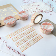 Premium Handmade Washi Tape Warm Heart 15mm x 10m - 4 pieces and 4 washi tapes on the table with 2 dark maroon flower branches, a sticker sheet, a chapter heading