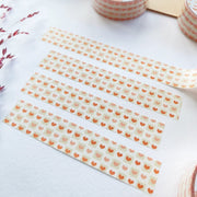 Premium Handmade Washi Tape Warm Heart 15mm x 10m - 4 pieces and 2 washi tapes on the table with a dark maroon flower branch