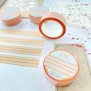Premium Handmade Washi Tape Warm Line 15mm x 10m - 4 pieces and 4 washi tapes on the table with a dark maroon flower branch, a sticker sheet, a chapter heading