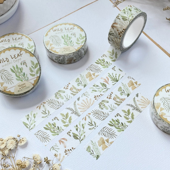 Premium Handmade Washi Tape Wild Leaf 15mm x 10m - 4 pieces and 5 washi tapes on the table with a white flower branch