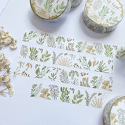Premium Handmade Washi Tape Wild Leaf 15mm x 10m - 4 pieces and 3 washi tapes on the table with a white flower branch