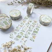 Premium Handmade Washi Tape Wild Leaf 15mm x 10m - 4 pieces and 5 washi tapes on the table with 2 white flower branches, a notebook