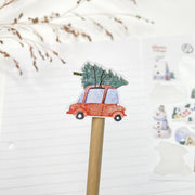 Winter Village kiss-cut sticker on a pencil: a red car with a Christmas tree on the roof