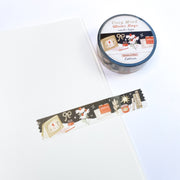 Cozy Mind Winter Days washi tape as a strip across an open notebook page, roll on the edge