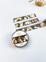 Slow Winter washi tape roll with its label, 15mm x 10m, strips of tape behind it