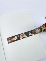 Slow Winter washi tape as a strip across an open notebook page, roll on the edge