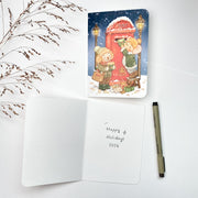 Sending Post Christmas card opened, with the blank inside and a pen