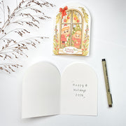 Window Frame Christmas card opened, English front with the blank inside and a pen