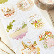 Premium Handmade Sticker Sheet A Day At Home 105mm x 148mm - a sheet on the table with a washi tape, an opened notebook