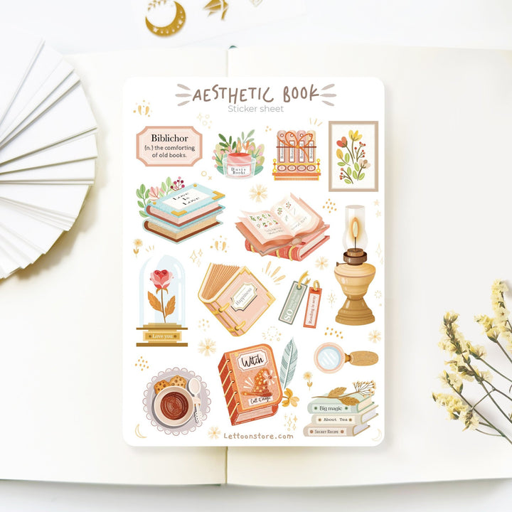 Premium Handmade Sticker Sheet Aesthetic Book 105mm x 148mm - a sheet on the table with a white flower branch, an opened notebook