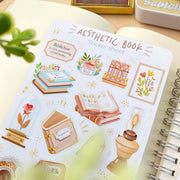 Premium Handmade Sticker Sheet Aesthetic Book 105mm x 148mm - a sheet on the table with a branch, an opened notebook
