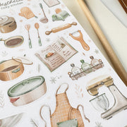 Premium Handmade Sticker Sheet Aesthetic Cozy Kitchen 105mm x 148mm - a sheet on the table with an opened notebook