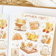 Premium Handmade Sticker Sheet Autumn in my Heart 105mm x 148mm - a sheet on the table with an opened notebook