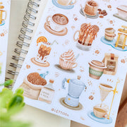 Premium Handmade Sticker Sheet Coffee 105mm x 148mm - a sheet on the table with a plant branch, an opened notebook