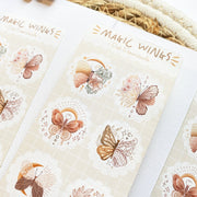 Premium Handmade Sticker Sheet Magic Wings 105mm x 148mm - 3 sheets on the table 