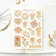 Premium Handmade Sticker Sheet Romantic Flower 105mm x 148mm - a sheet on the table with a white flower branch, an opened notebook
