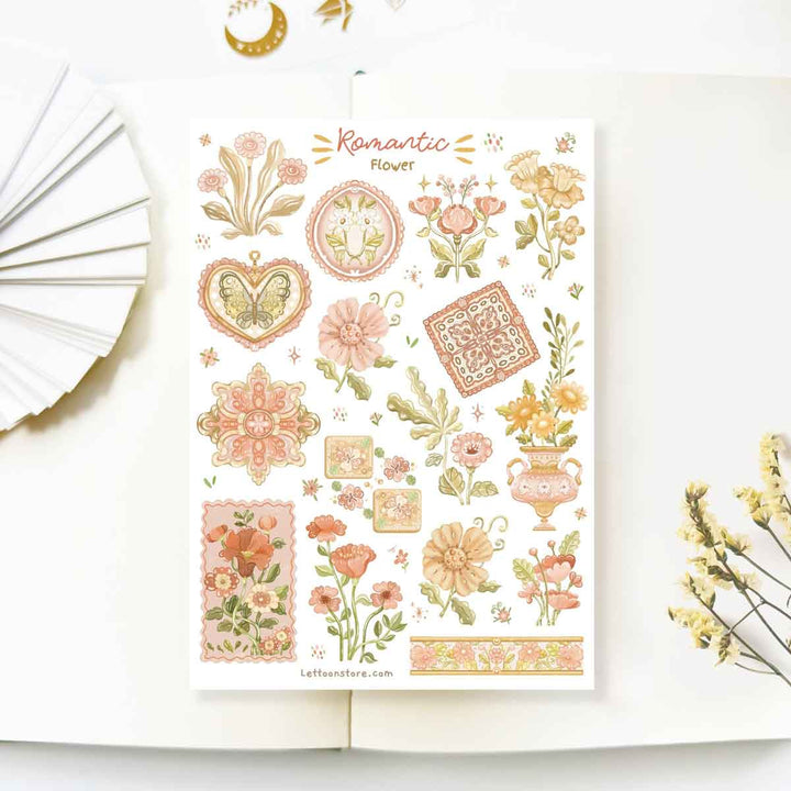 Premium Handmade Sticker Sheet Romantic Flower 105mm x 148mm - a sheet on the table with a white flower branch, an opened notebook