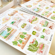 Premium Handmade Sticker Sheet Spring Garden 105mm x 148mm - 2 sheets on the table with an opened notebook