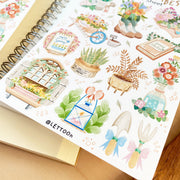 Premium Handmade Sticker Sheet Spring Vibes 105mm x 148mm - a sheet on the table with an opened notebook