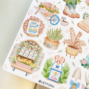 Premium Handmade Sticker Sheet Spring Vibes 105mm x 148mm - a sheet on the table with an opened notebook